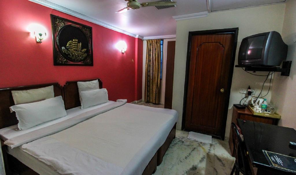 Hotel Pigeon International Bangalore Chambre photo