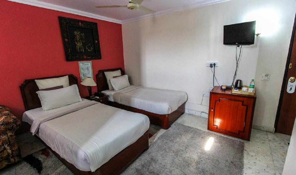 Hotel Pigeon International Bangalore Chambre photo
