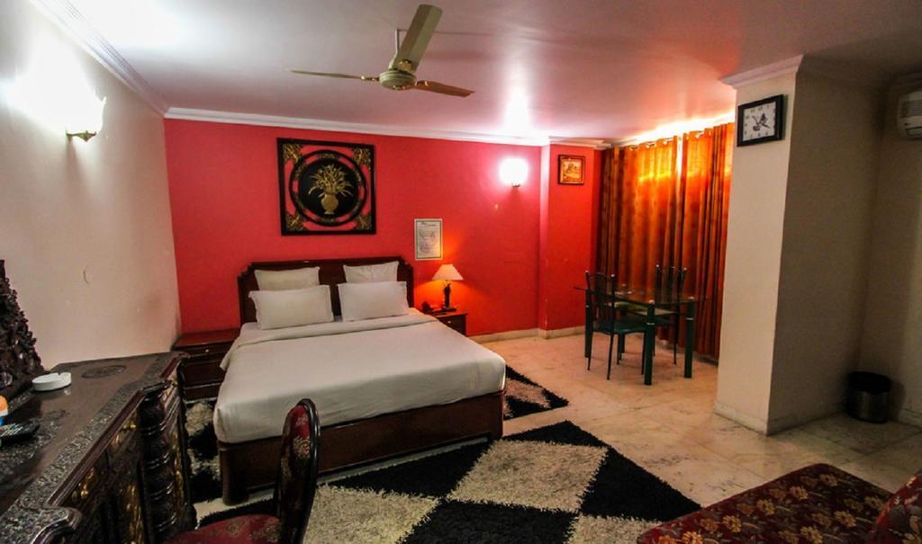 Hotel Pigeon International Bangalore Chambre photo