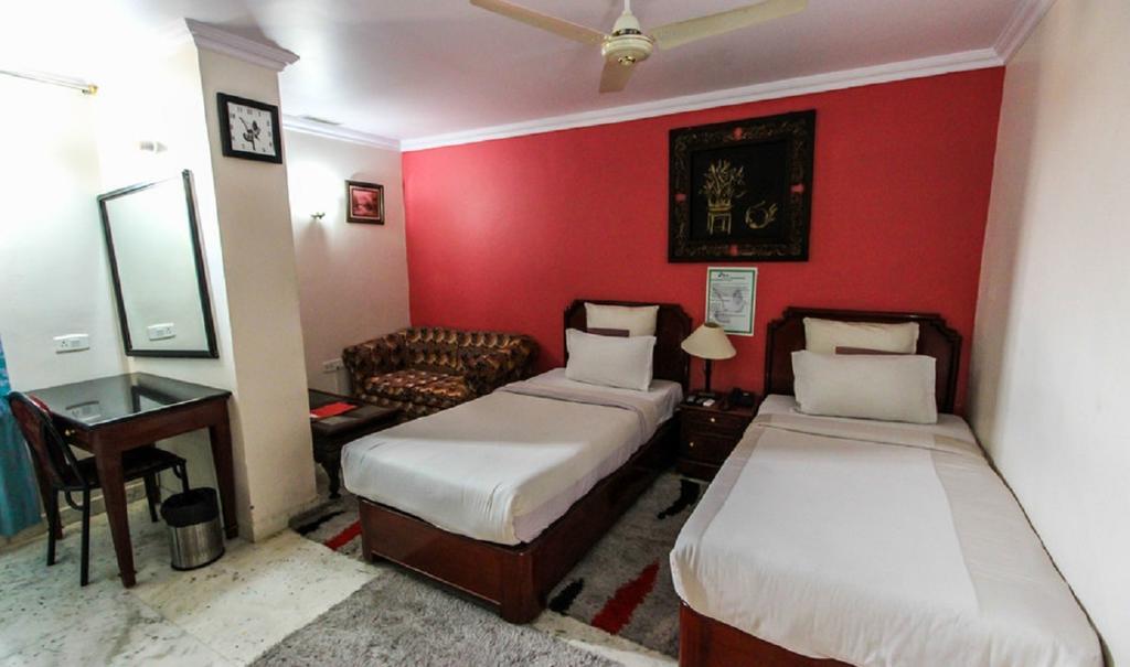 Hotel Pigeon International Bangalore Chambre photo