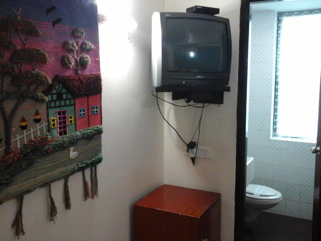 Hotel Pigeon International Bangalore Chambre photo