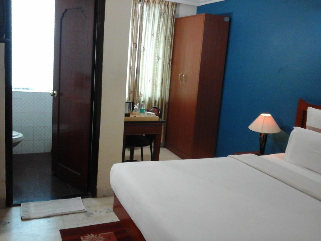 Hotel Pigeon International Bangalore Extérieur photo