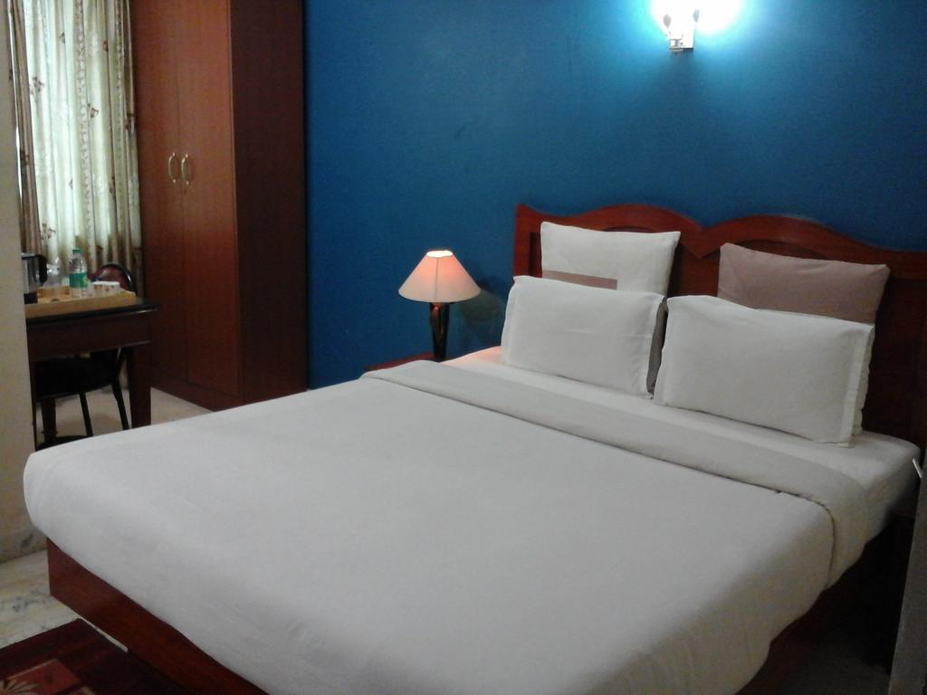 Hotel Pigeon International Bangalore Extérieur photo